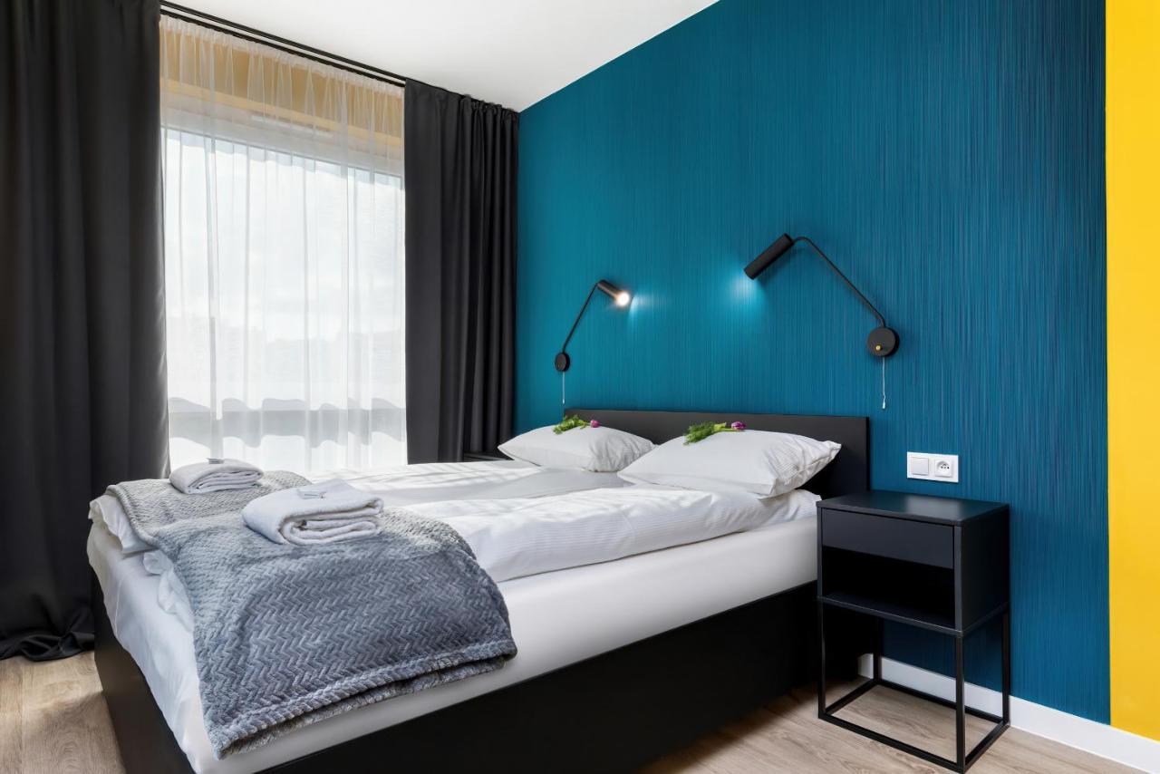 Modern City Center Apartments By Noclegi Renters Poznan Bagian luar foto