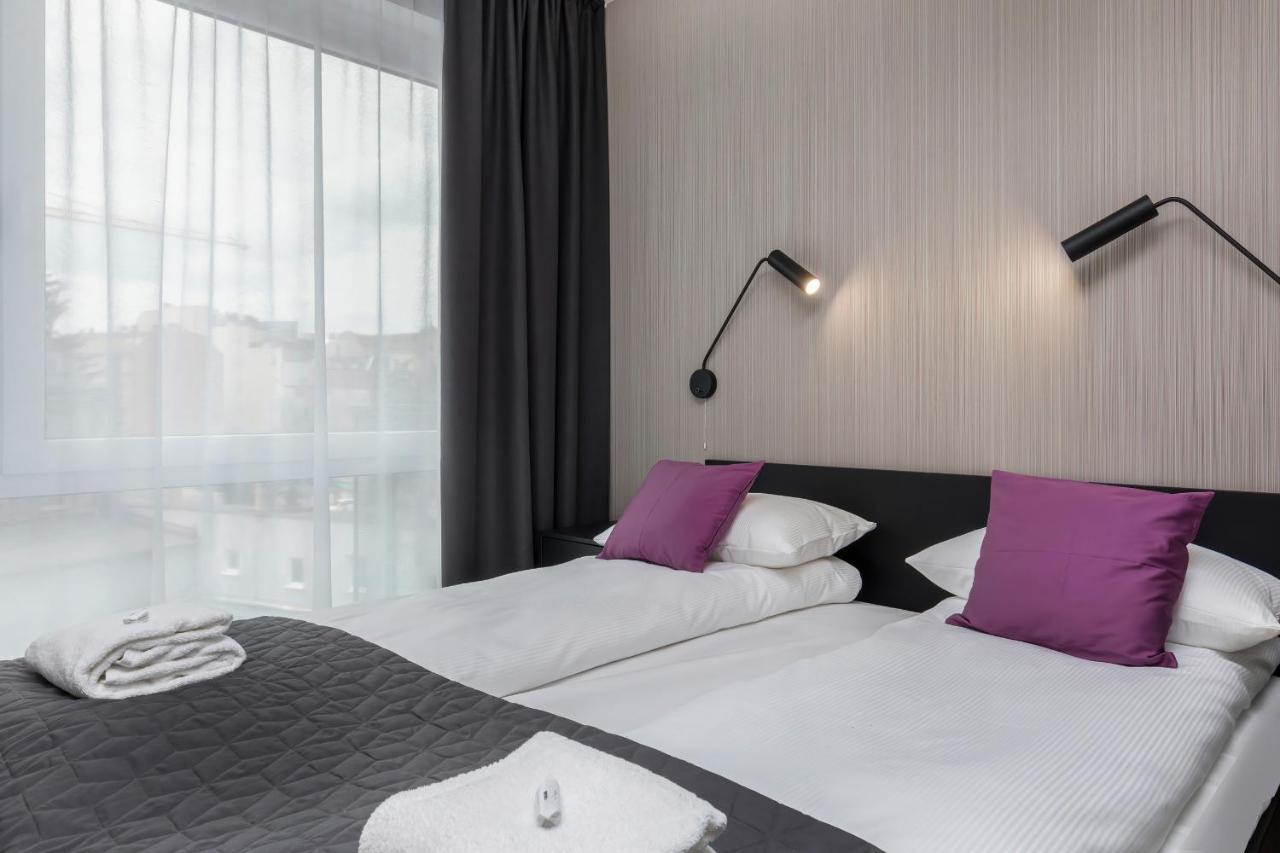 Modern City Center Apartments By Noclegi Renters Poznan Bagian luar foto
